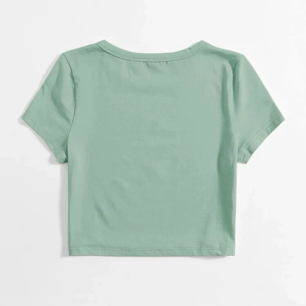 Mint grön t-shirt/topp, aldrig använd, jätteskönt material.. Toppar.
