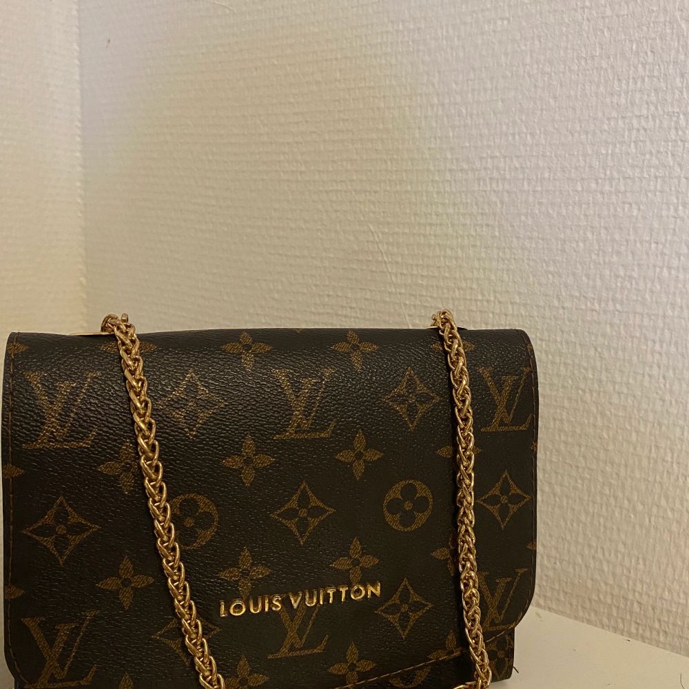 Brun Louis Vuitton väska