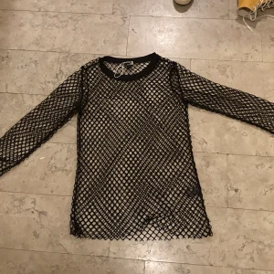 Fishnet tröja - Den är inte tajt 