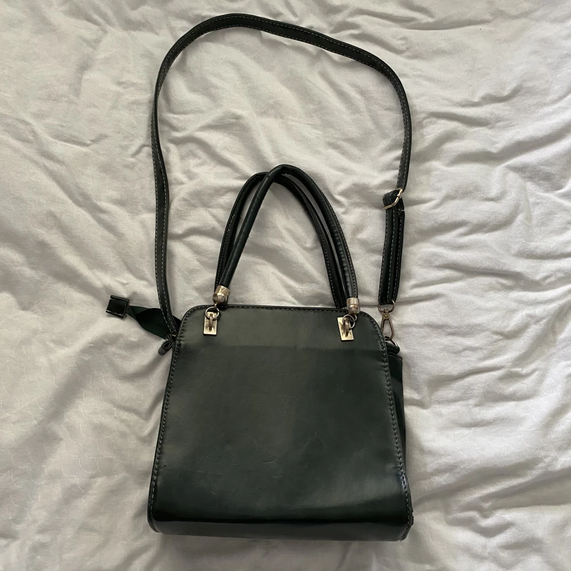 Mörkgrön väska 