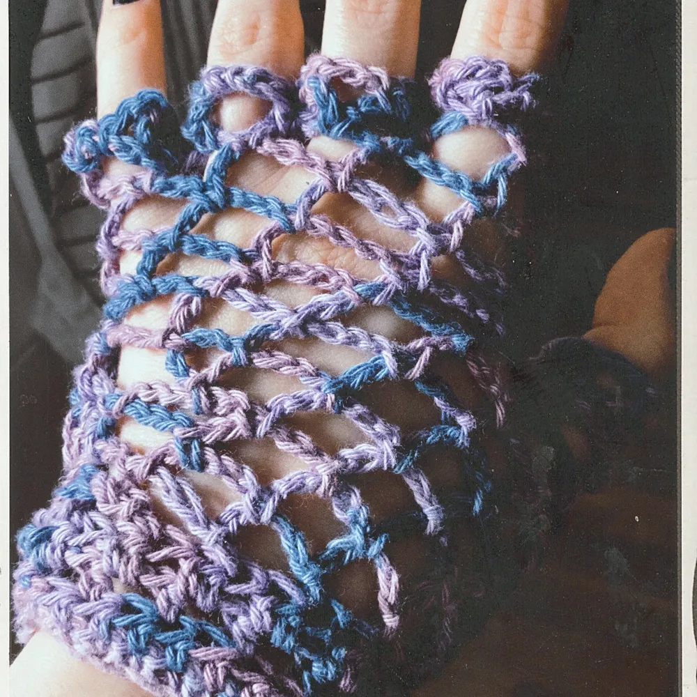 Crocheted fishnet fingerless gloves (colorful edition). Handmade. One size, one color, but can customize it to your needs.  Contact this ad if you want a custom order.  Can make anything!. Stickat.