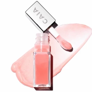 Juicy lip oil - Oäppolja från caia, oanvänd 