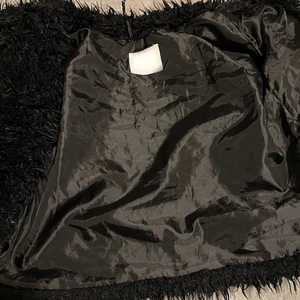 Päls jacka  - Svart fluffig pälsjacka 