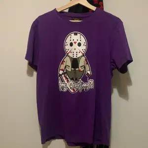 purple any questions tshirt with killer in super good condition