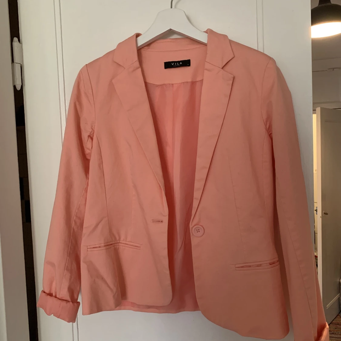 Korallfärgad blazer 