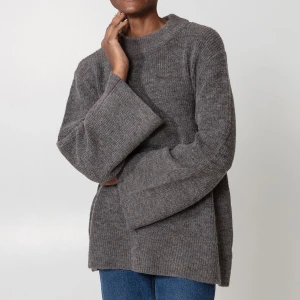 Stickad tröja  - Såååå fin stickad tröja från Indiska, använd 1 gång 