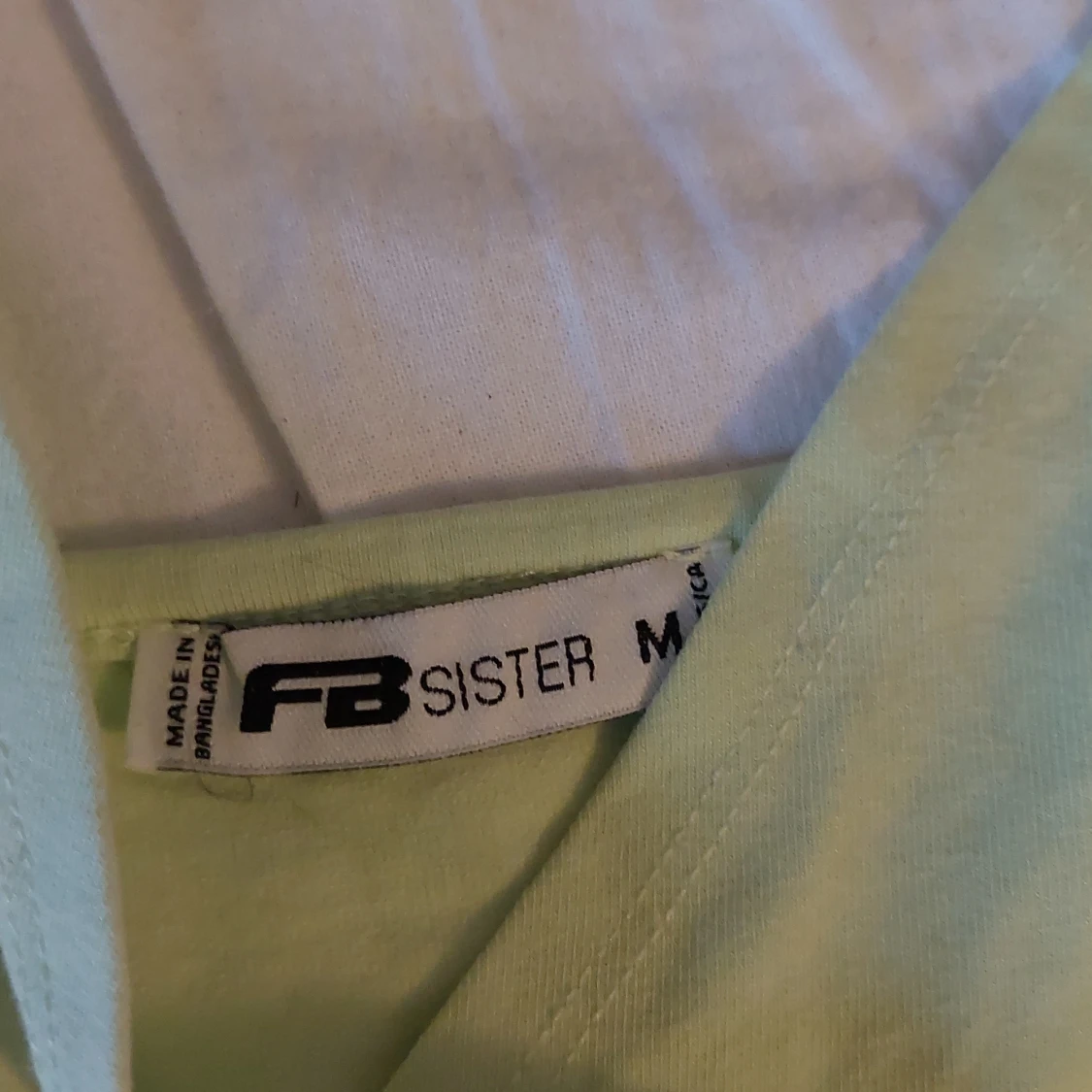 Ljusgrönt linne - 91