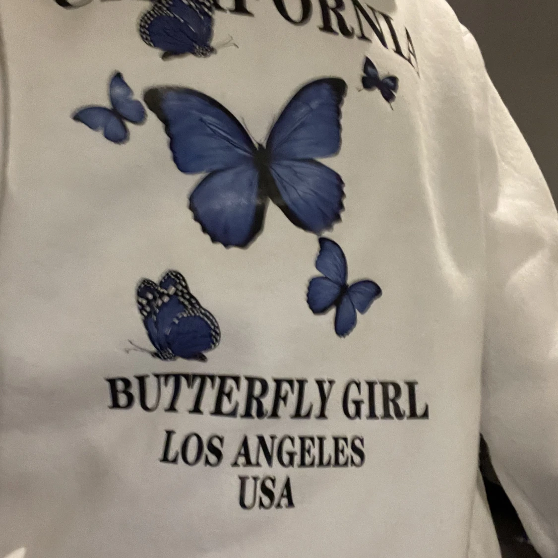 Vit fjärils tröja - 90