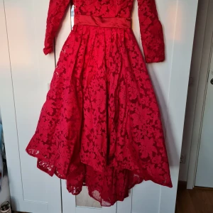 Red dress - New, not used. Size 10 US, bust size 93cm, waist 75cm, hip 101cm, hollow to hem 145cm.