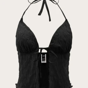 Tie top - Är skiit snygg men vågar inte ha på mig den, är helt ny och aldrig använt 