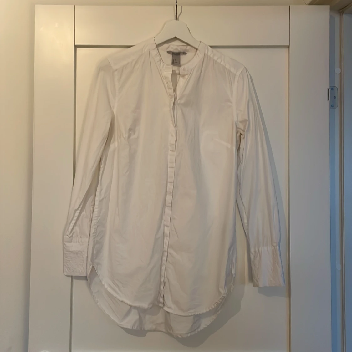 H&M skjorta långre modell strl 38