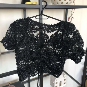 Svart topp - Svart topp som jag köpt i Thailand, oanvänd och passar mig som i vanliga fall har S