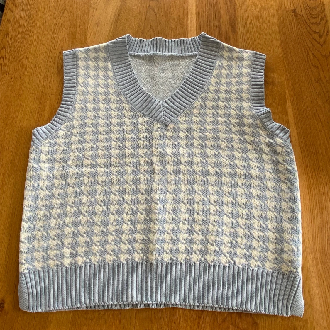 Stickad väst