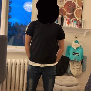 En fin t-shirt som är använd ett par fåtal gånger.