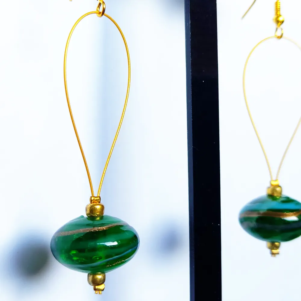 Handmade earrings with green glass bead, new. Accessoarer.