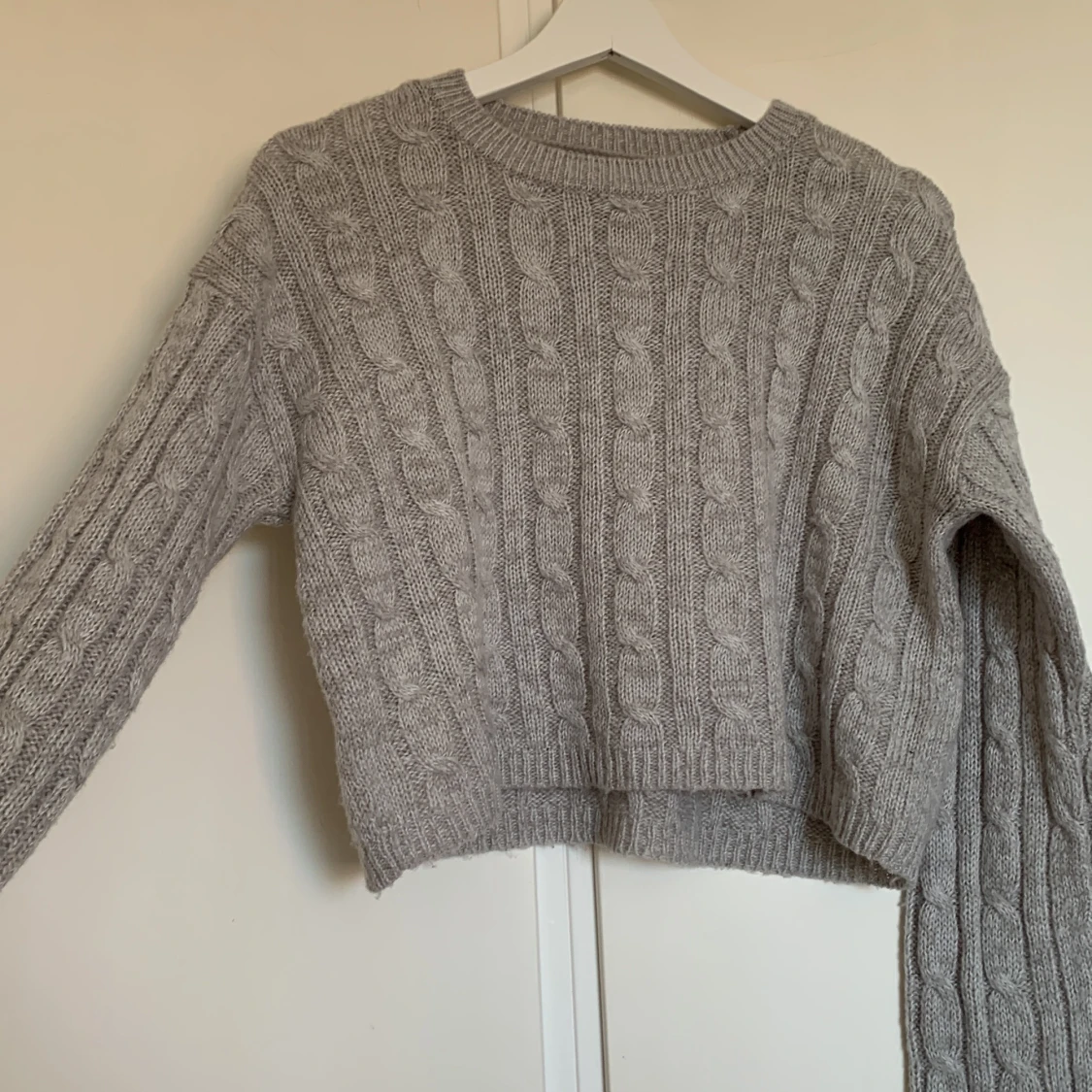 Stickad tröja