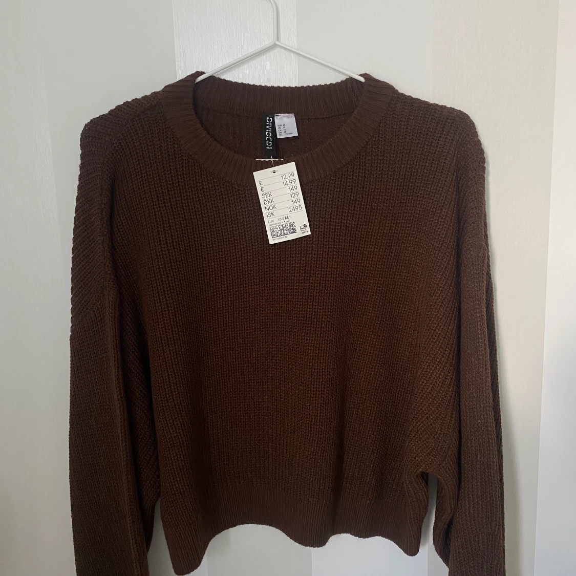 Brun tickad tröja