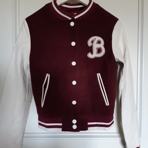 Baseball Jacket - Only used 2-3 times. Conditions are supergood, like new! Fake leather sleeves.
