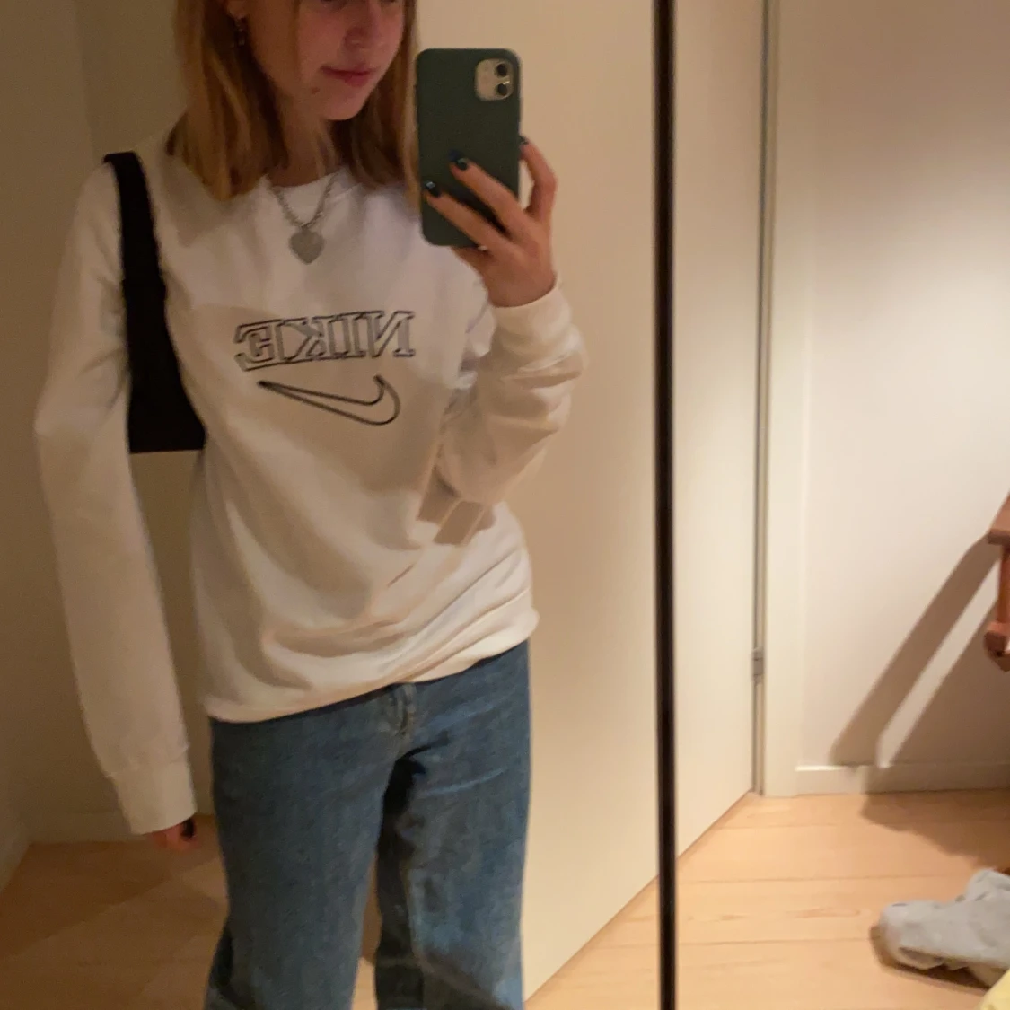 nike tick sweatshirt