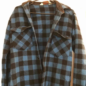  - Svart och blå rutig Jacka