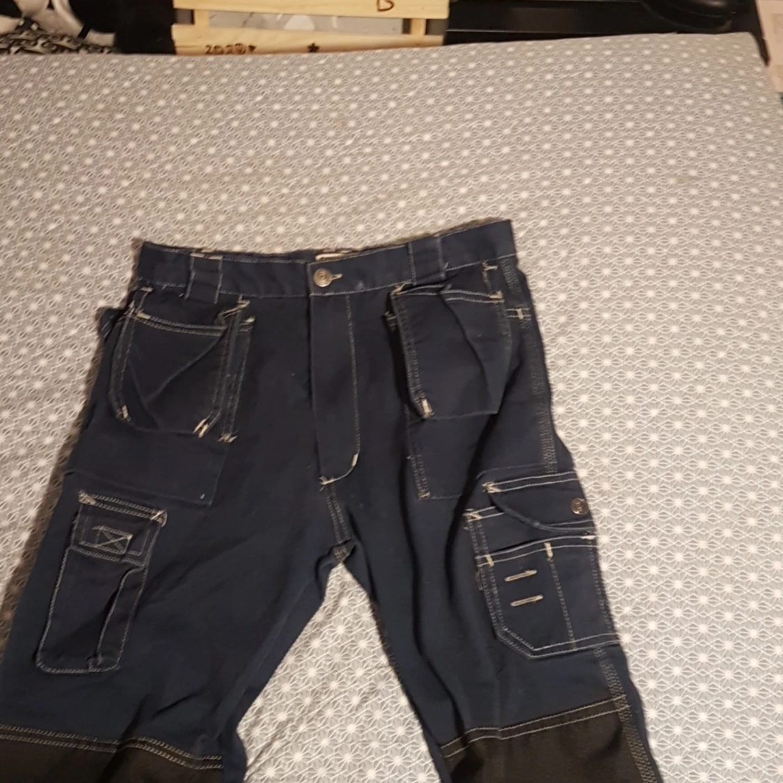 Ett par snickarbyxor - 90