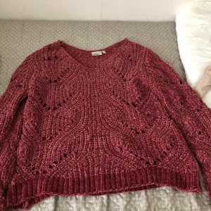 Stickad tröja -  En rosa fin stickad tröja