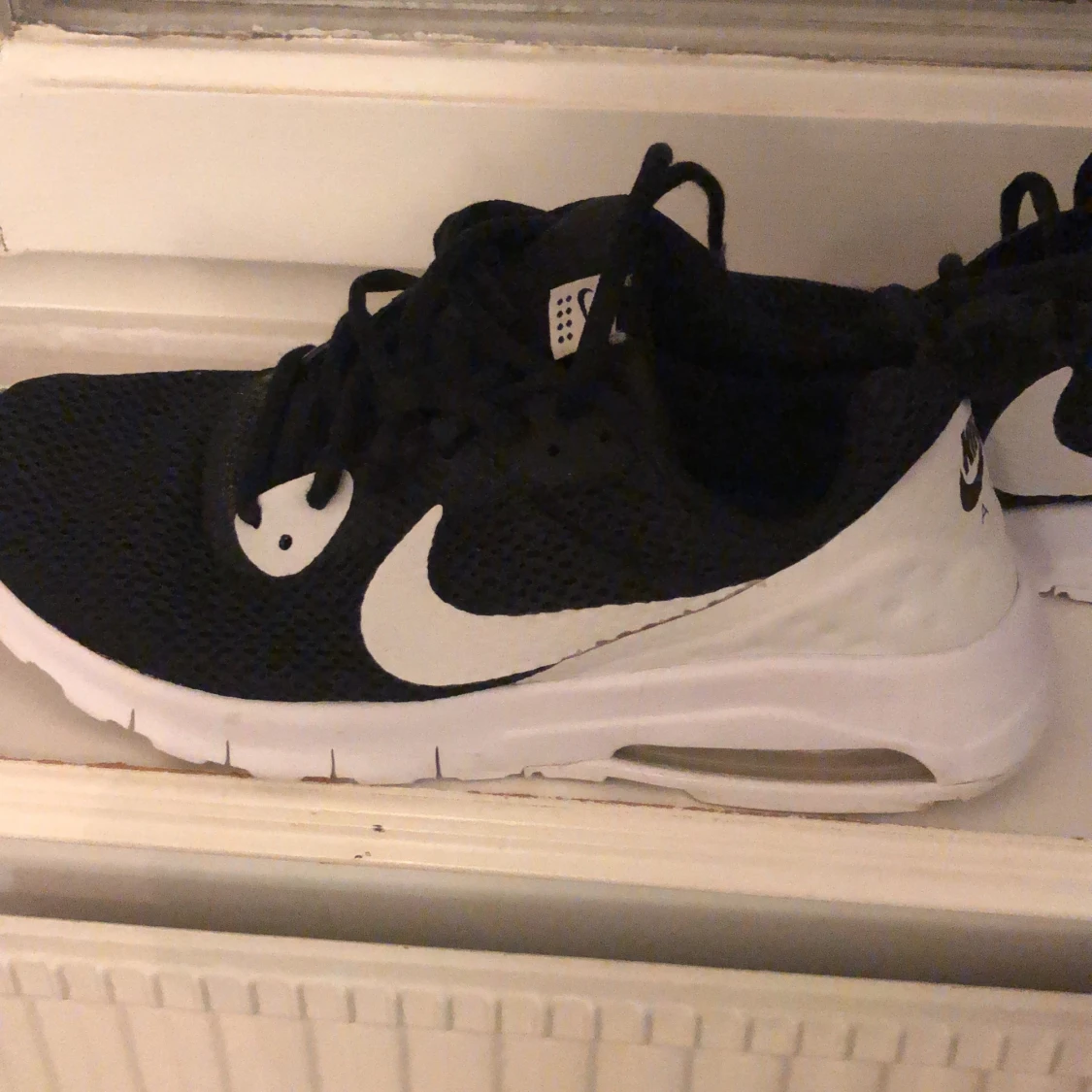 Svart/vita Nike skor