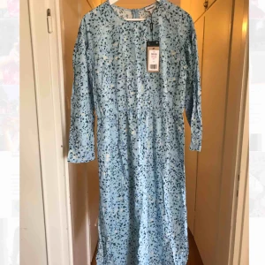  - NEW Weekday dress Size S, but has a loose fit.