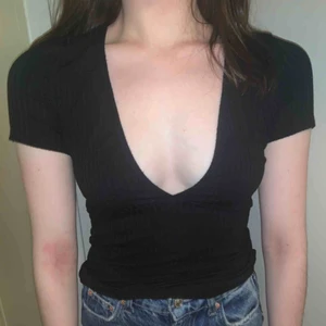  - Stretchy top with low front, great with or without bra