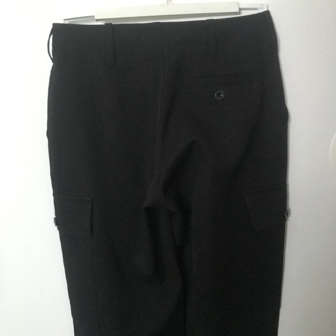 Svarta långa raka kostymbyxor m. Fickor på sidan