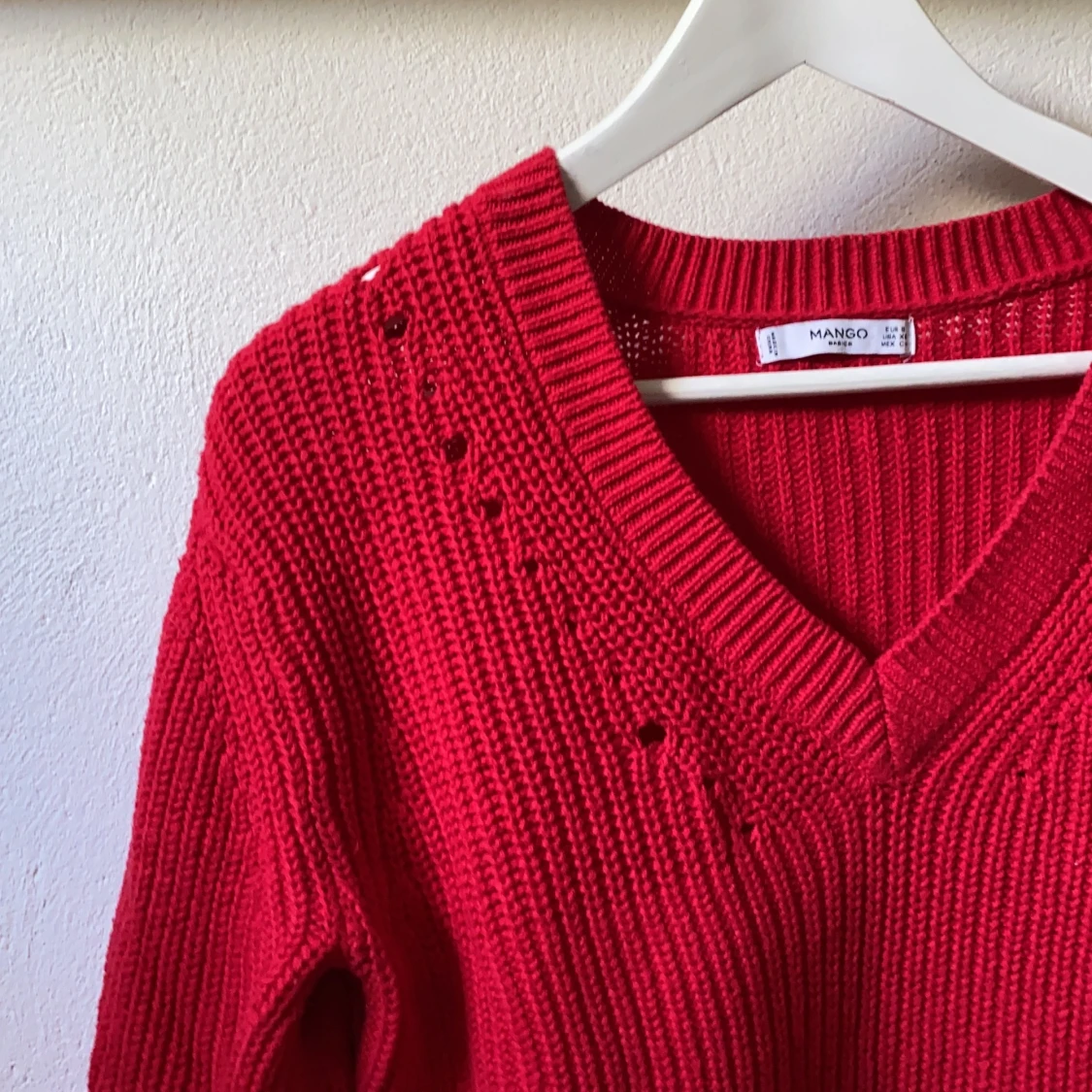 Röd stickad tröja 
