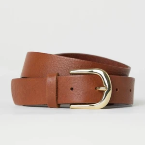 Brunt skärp - Helt vanligt brunt skärp med guld metall på spännet. Storlek S. Oanvänd. Nypris: 149kr