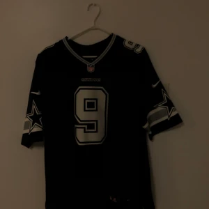 tony romo, dallas cowboys, jershey! - never worn, over sized, comfy and not as common size he stopped playing. bought for 120$
