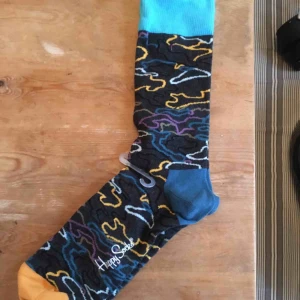  - Oanvända sockor från Happy Socks, storlek 41-46. Etikett kvar! Frakt tillkommer