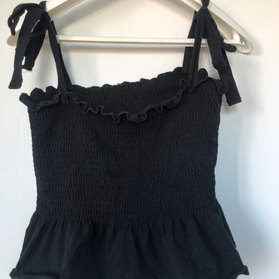 Gullig svart top från HM  - 90