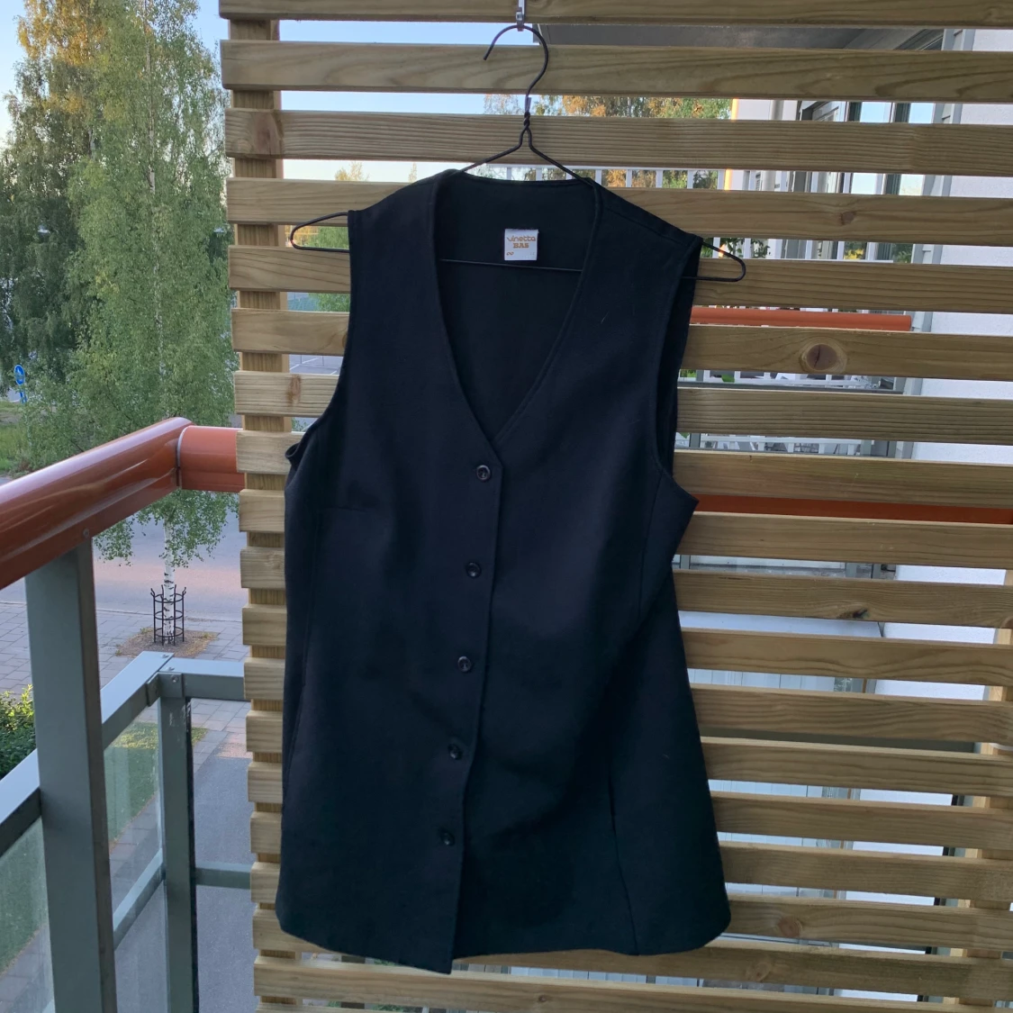 Längre väst storlek s/m