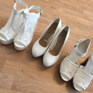  - Vita klackskor i storlek 37-38. Nästintill oanvända. 50:- för ett par