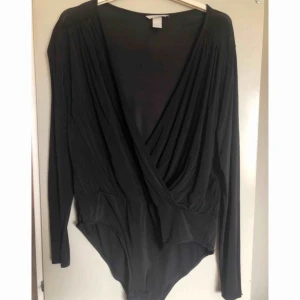  - Svart body! Täckande baktill, knappt använd.