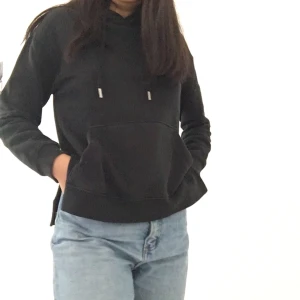 Svart hoodie - En svart jätte skön hoodie. Storlek XS/S