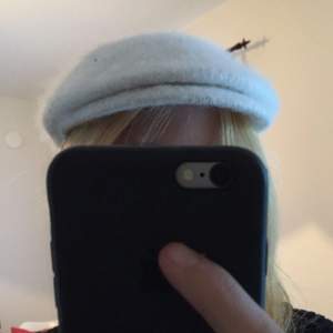 French beret, white, 80% angora. Hardly worn :) 