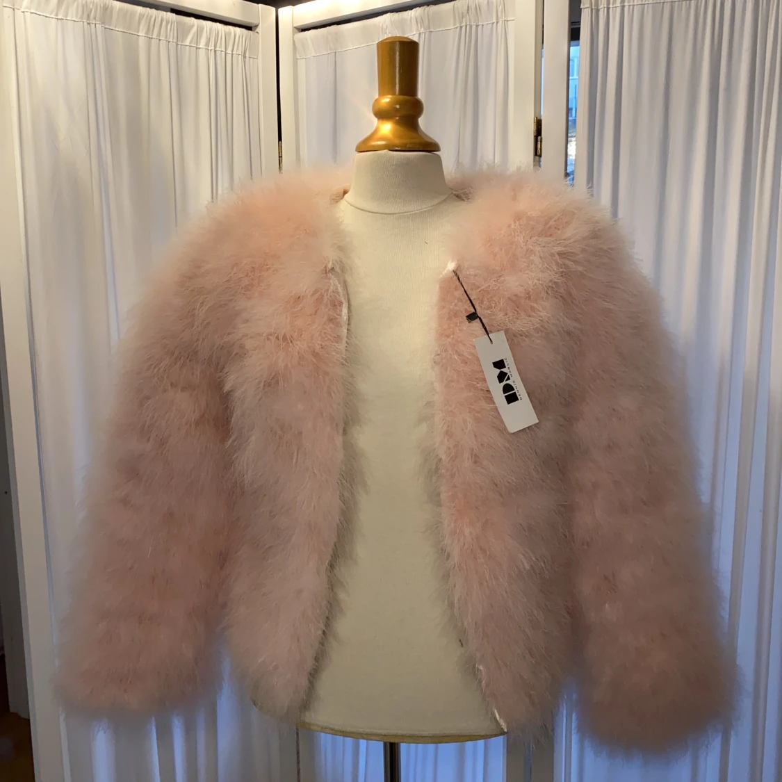 Ljusrosa fluffig vinterjacka