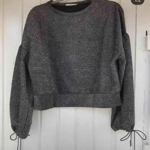  - As ball glittrig tröja!