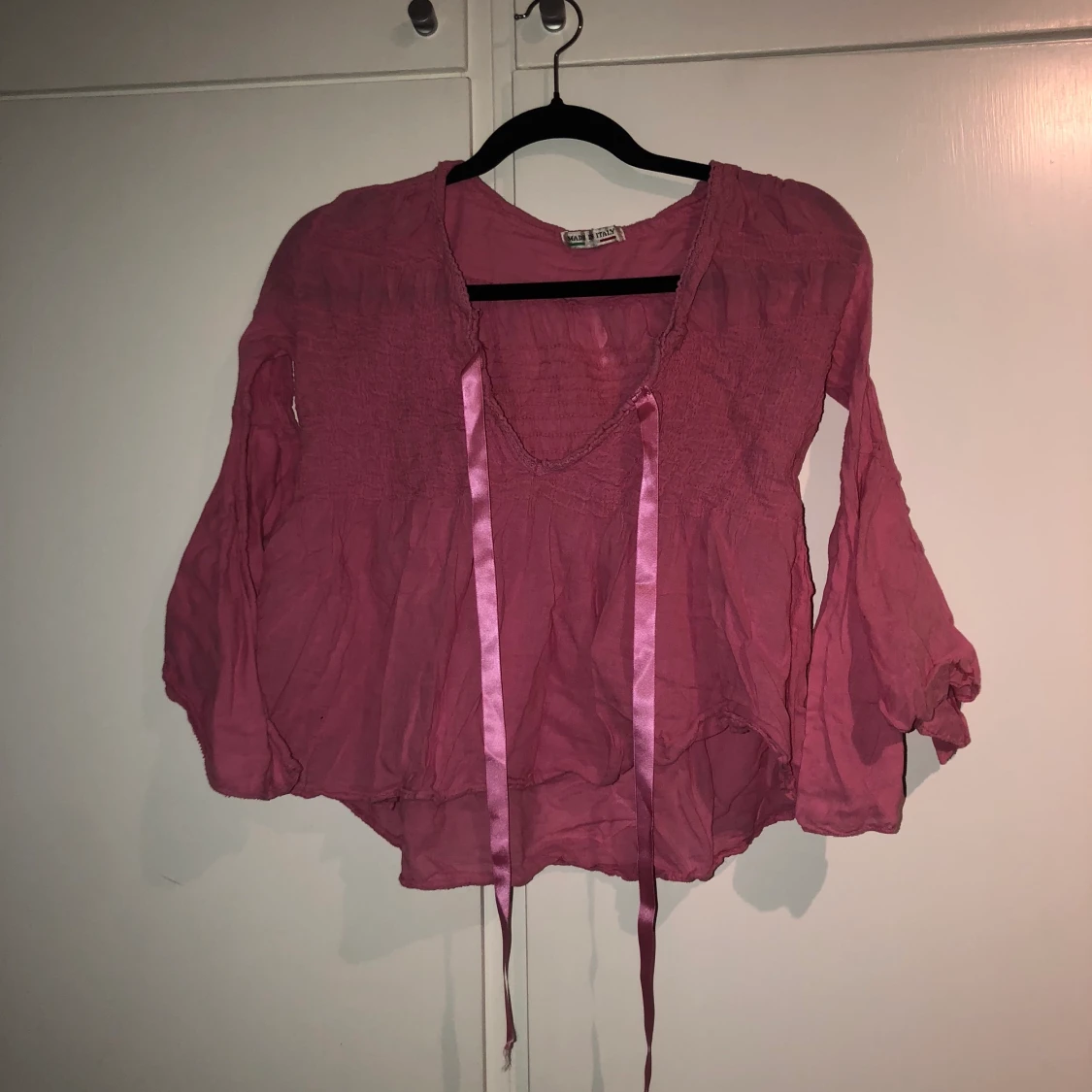 Rosa tröja med vida ärmar storlek XS/S