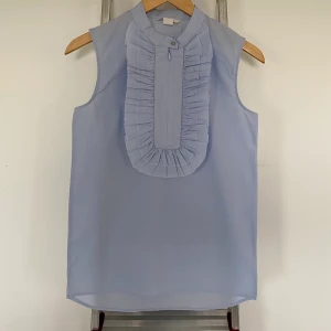 H&M sleeveless top - H&M light blue poplin sleeveless top. Size 34. Great condition, never worn.
