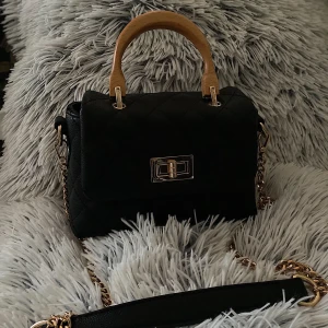 Väska  - En oanvänd väska, aldrig använd 