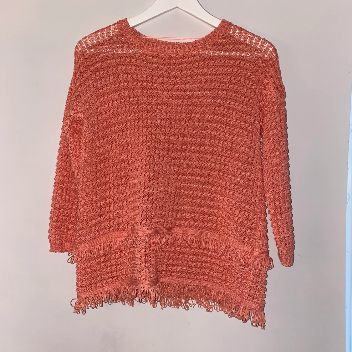 En stickad mysig tröja till salu