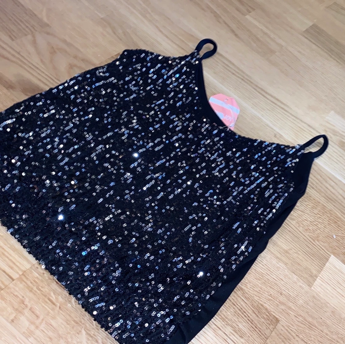 Glittering svart linne