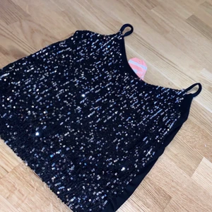 Glittering svart linne - S/m/l svart glittering linns