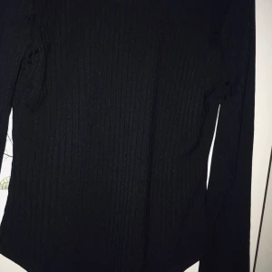 Ribbad body, djup rygg  - Aldrig använd , prislapp kvar 