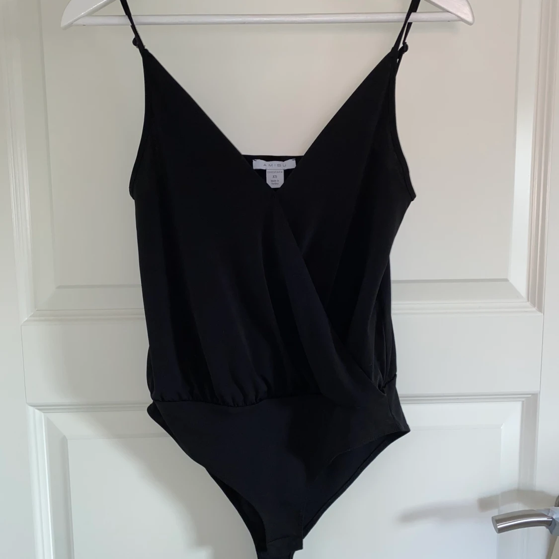 Svart bodysuit